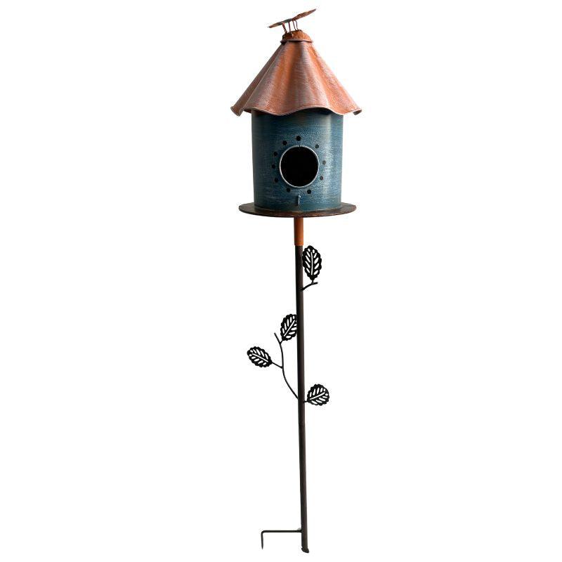Birdhouse With Perched Bird on Leafy Garden